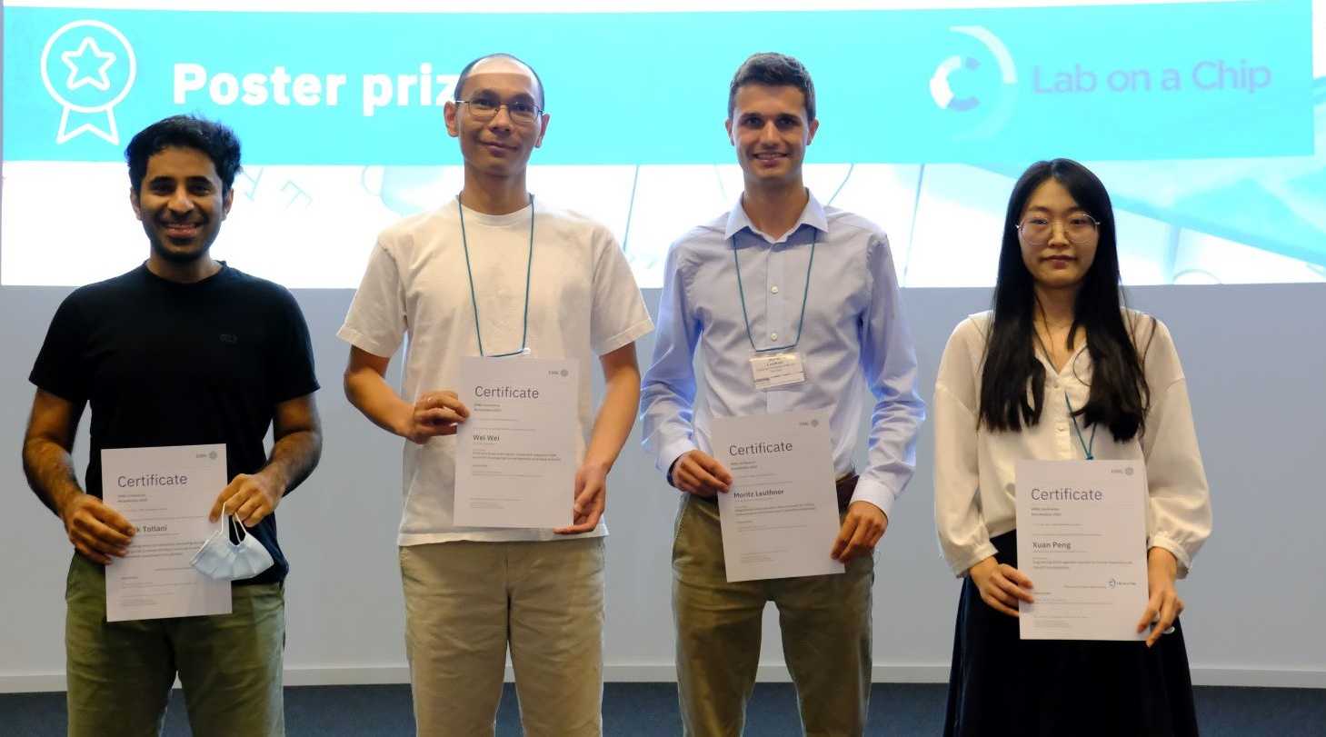 Poster prize ceremony at EMBL "Microfluidics" Conference in Heidelberg, Germany: