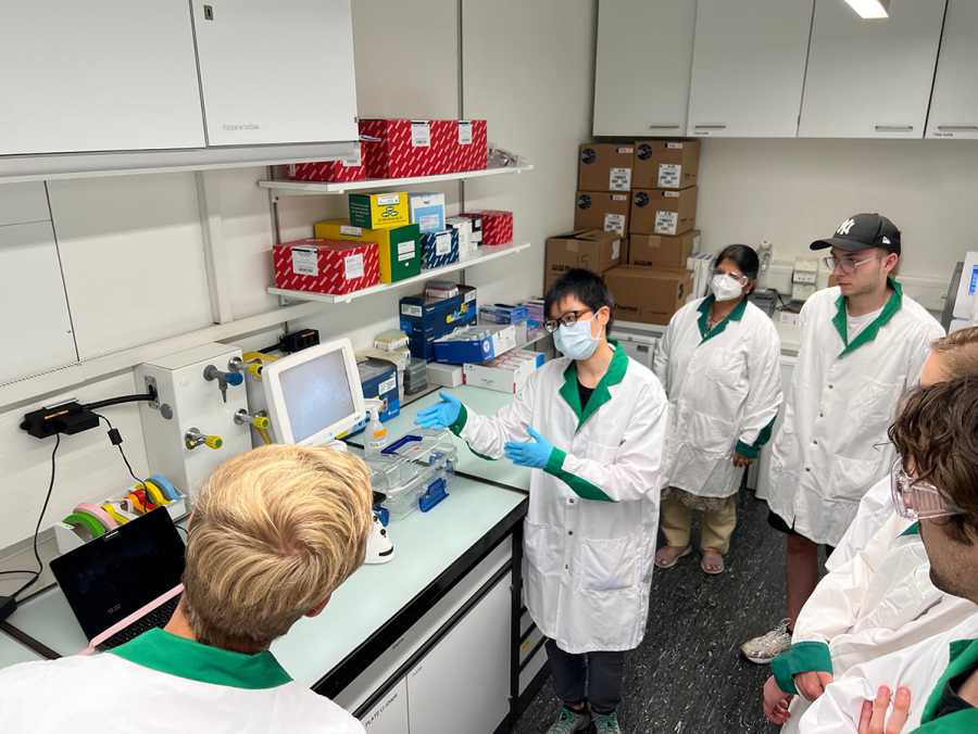 Enlarged view: Visitors in one of the labs