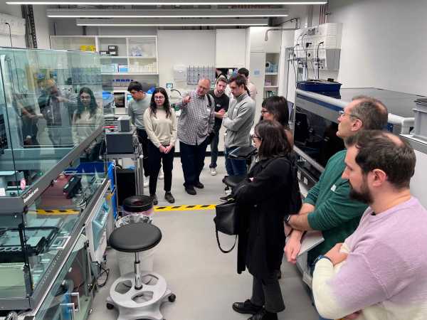 NGB fellows and partners at the lab tour