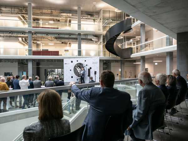 guests in the atrium during the welcome addresses